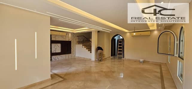 Ready to move twin house 330 m fully finished AC. S and kitchen with appliances  for sale in mivida compound new cairo