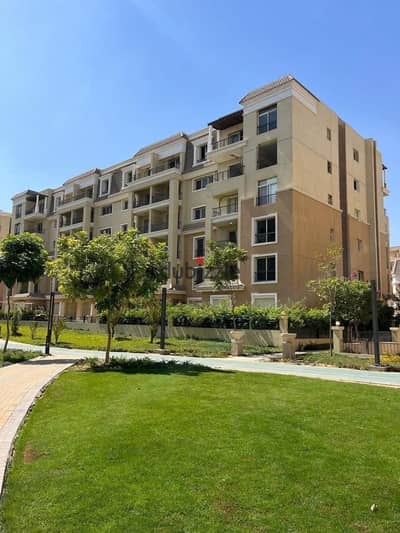 by 50% off garden apartment for sale with private entrance by incredible price next to madinaty in sarai new cairo