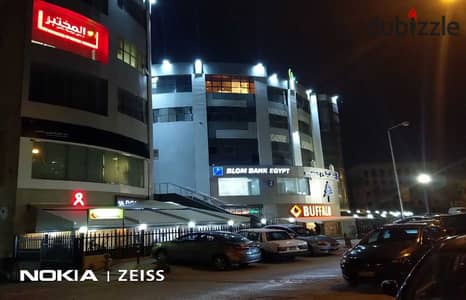 For sale or investment, a commercial shop in the University Mall, first floor