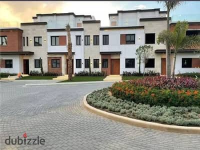 Townhouse snapshot for sale in Golden Square with a special cash discount and an open view on the landscape in Azzar Compound