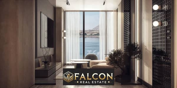 For sale, a hotel apartment, immediate delivery, with a direct and open view of the Nile and the Pyramids, fully finished with furniture, appliances a