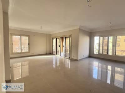 A garden view apartment for rent with a kitchen in Acacia Compound in the First Settlement