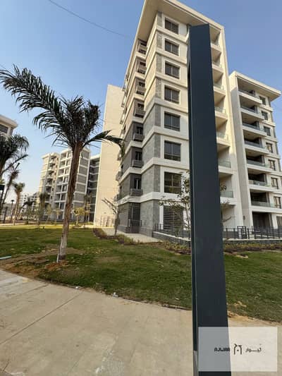 For sale in the first fully Smart City in Egypt, an apartment in City of Light, with an area of 147 sqm, with a wide garden view, north-facing, untouc