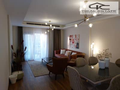 apartment with garden for sale in Cairo Festival City (CFC) New Cairo READY TO MOVE Fully furnished special view in prime location in fifth settlement