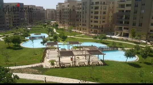 Apartment for sale, semi-finished, in The Square Compound, Sabbour, New Cairo, overlooking the largest landscape and lakes