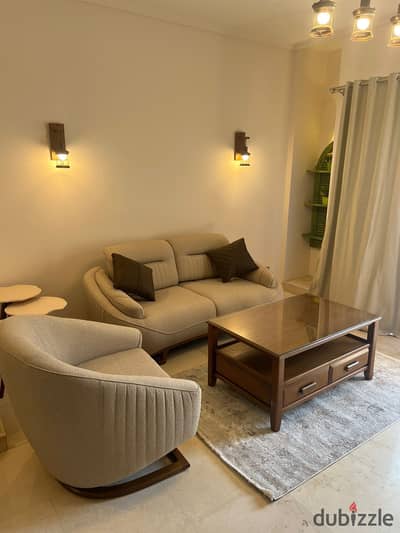 furnished Studio for rent with garden first use in Compound The Village New Cairo