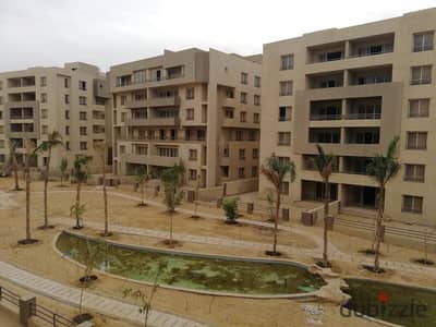 Apartment for sale, semi-finished, in The Square Compound, Sabbour, New Cairo, overlooking the landscape and the lake