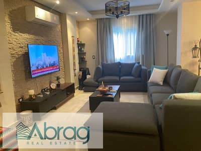 For rent, a two-bedroom apartment with a garden, modernly furnished, with appliances, Zayed Dunes Compound, Sheikh Zayed