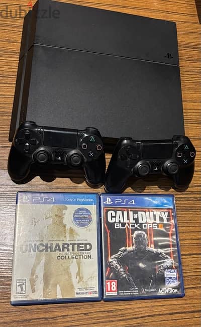 Playstation 4 fat 500 gb with controller and 2 games