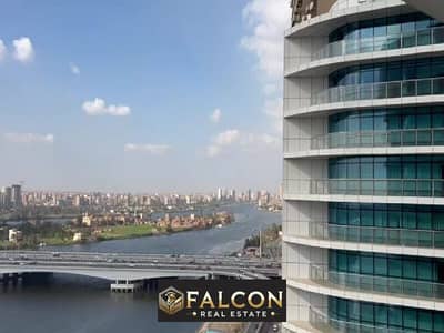 Ready to move in now, an apartment in the Hilton Hotel, with a distinctive view of the Nile Corniche, high-end finishing, and hotel services,