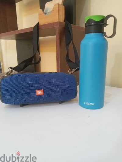 Bluetooth JBL Speaker for your trips and 12 hours Coolman or hot Tank