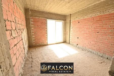 ground garden apartment corner prime location for sale in icity new cairo ready to move by installments