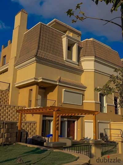 villa townhouse for sale by lowest price in installment over 12 years prime location next to madinaty on suez road in sarai new cairo