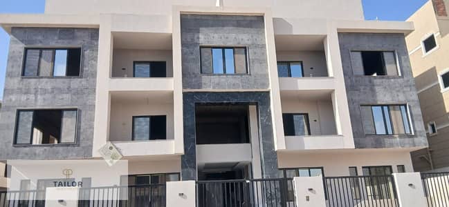 Apartment for sale in a villa in the West Golf area, second number from the Ring Road, behind Stone Park Compound and behind Katameya Heights Compound