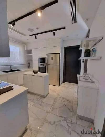 For sale, an apartment with immediate delivery, fully finished, including air conditioners and a kitchen, in a prime location in Heliopolis, and inhab