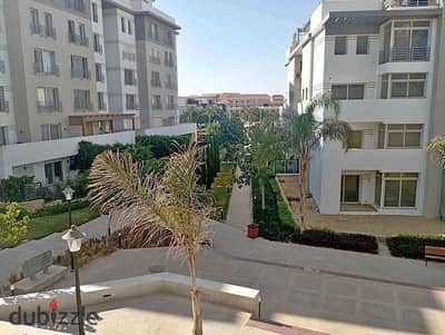 Ground floor with a garden for sale with a distinctive view in the heart of the Fifth Settlement, minutes from AUC in the Hyde Park Compound