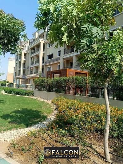 An apartment with a distinctive view and a fantastic location on the Suez Direct Road in Sarai Compound, with payment plans of up to 12 years.