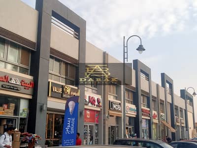 A shop for rent in Madinaty, Craft Zone, with various activities, located next to Al-Ban Zahir, a prime corner location in the commercial market.