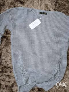 Pullover with ticket ( brand ) 250 instead of 485 0