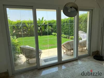 140m² apartment + 60m² garden (immediate delivery) for sale with a 10-year installment plan, located in a compound opposite Al Rehab.