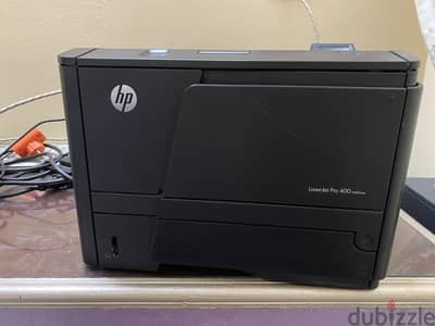 “طابعة HP 400dn بجودة عالية - مستعملة”