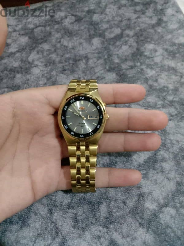 ساعه orient 1