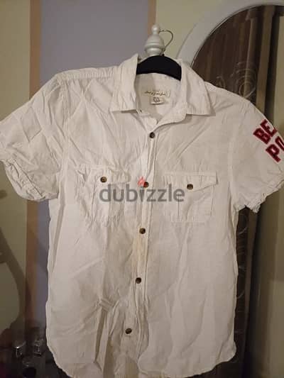 قميص h&m اولادي سن 12 لم يستعمل