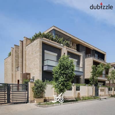 Standalone villa, fully finished, ready for immediate occupancy, with installments over 7 years, for sale in front of the airport in Taj City, First S