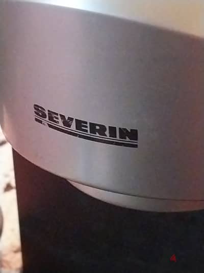 ماكينه قهوه severin محتاجه طرمبة ميه ب1200 جنيه بشارع كلوت بك