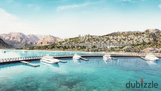 Panoramic view of the sea and pool, a 3-bedroom hotel-finished chalet for sale with a special discount and a 10% down payment in the heart of Galala, Ain Sohna (and live the distinction at the lowest price)