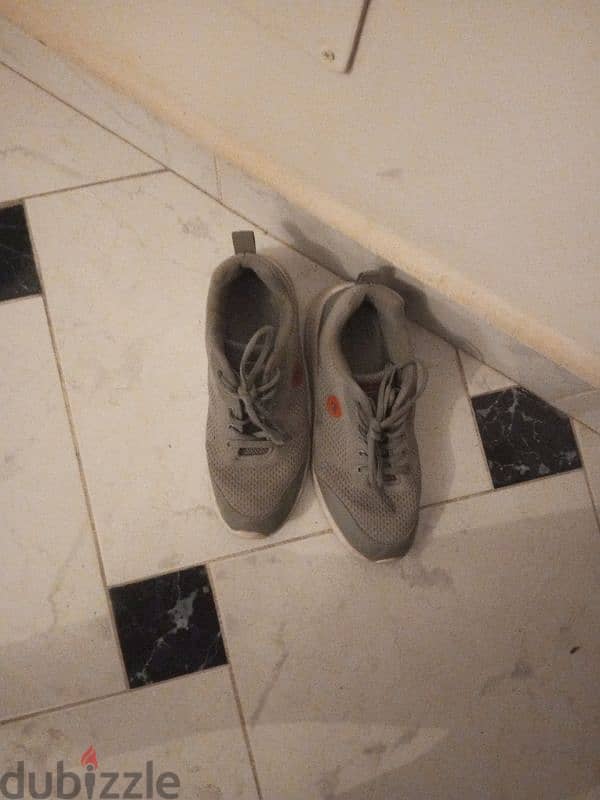activ shoes gray in colour 1