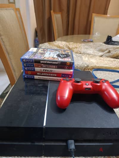 PS4 fat 1TB used with 5 games and without controller good condition