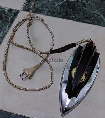 مكواة الملابس