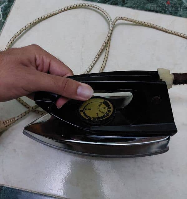 مكواة الملابس 4