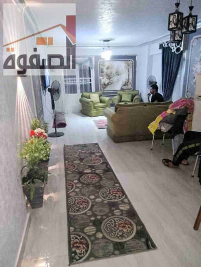 For rent furnished apartment in the new Awqaf buildings in Arab Al-Maadi, service location and close to the Arab stop, fully air-conditioned