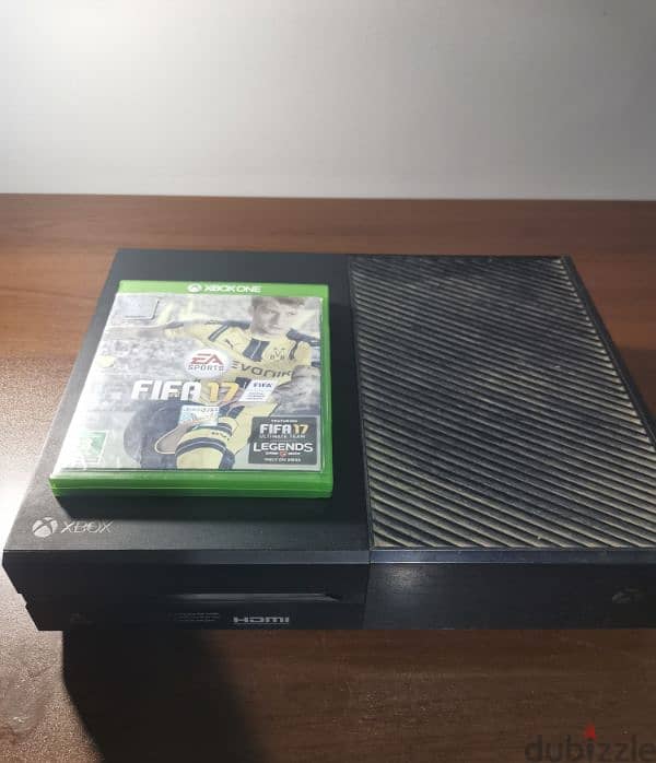 Xbox One 1 TB with a game 5