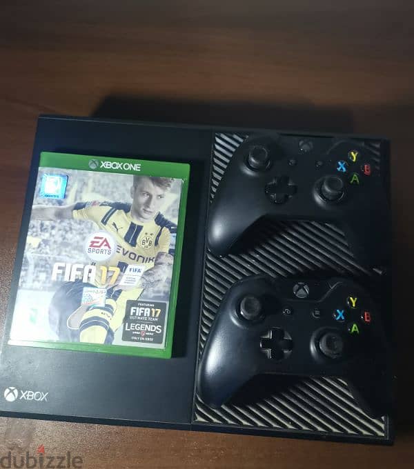 Xbox One 1 TB with a game 6