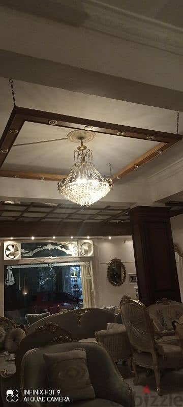سقف ديكور خشب مفرغ بالانوار