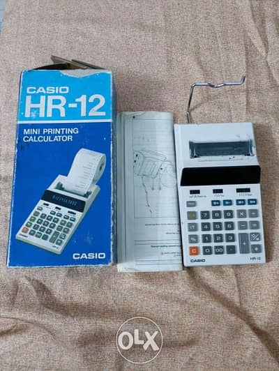 Casio mini printing calculator اله حاسبة