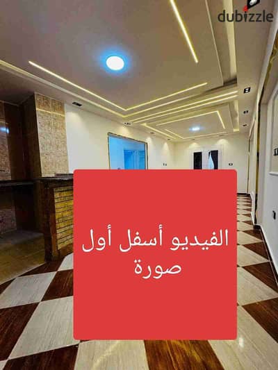 Apartment in Al-Ajami, Palm Beach, next to the main road directly, distinguished residential and vacation location in the heart of services and markets, fully registered with all facilities.