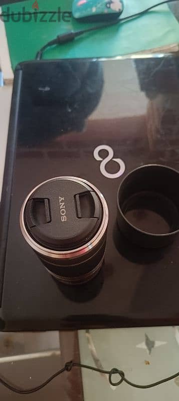 عدسة سوني زوم 55-210