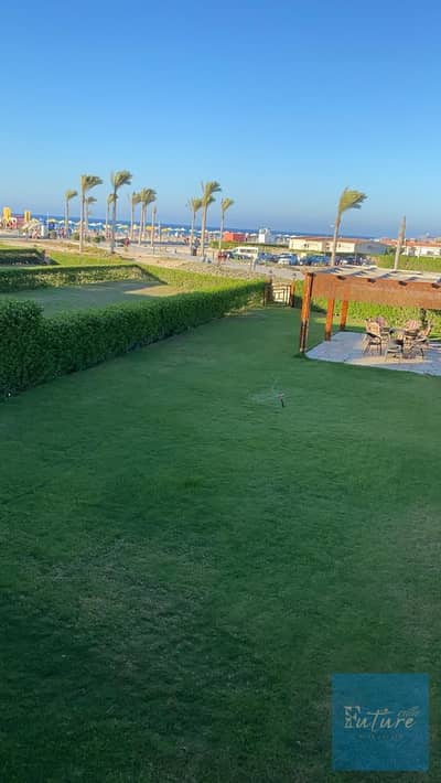 Standalone villa for sale with hotel-style furnishing and a stunning view overlooking a private garden in Amwaj, North Coast.