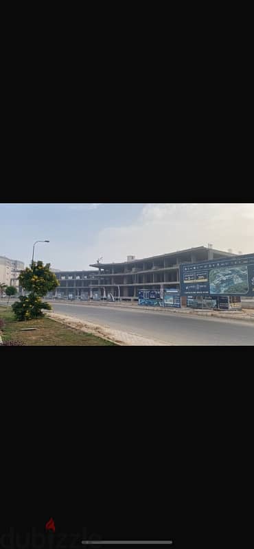 بدون عموله محل  امام جامعة زويل  من المالك  في مول  تقسيط علي ٥ سنين