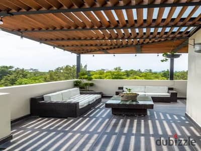 Rooftop apartment in a compound with a direct view of the pyramids, currently rented in dollars daily, for sale at the lowest price in a fully built a