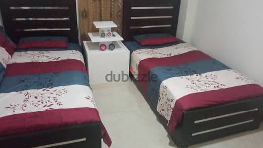 عدد 2سرير حالة ممتازة مع مراتب