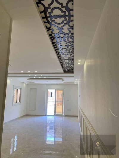 Apartment for sale, 121 m², fully finished with kitchen, in installments, on the Suez Road, in front of Madinaty
