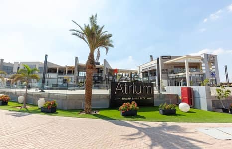 Shop with outdoor area in Atrium Mall directly in front of Global Care Hospital