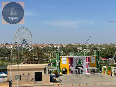 Apartment for sale in Opera City Compound, Sheikh Zayed, with a very distinctive view of Zed Park. Immediate delivery from the owner. Lowest price for