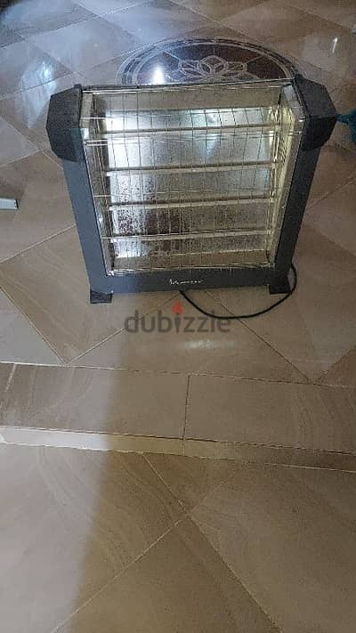 دفايه كهربائية كومتيل ٤ شعله ٢٠٠٠ وات