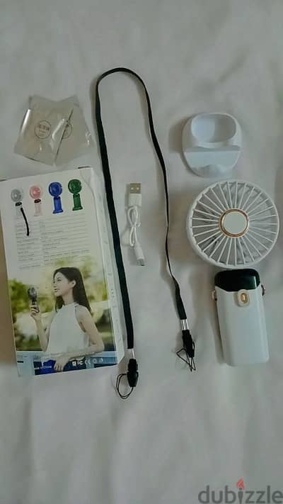 مروحة اليد المحمولة LED digital display fan اشتريته من شى إن